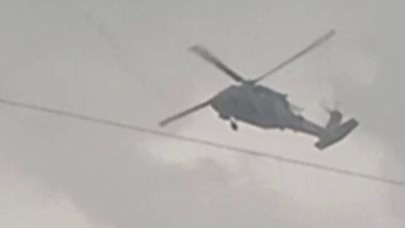 Erzurum Karayazı'da askeri helikopter dolu ve yağmura yakalandı